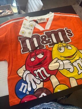 Fashion Nova Orange M&M's Graphic Short Sleeve Tee